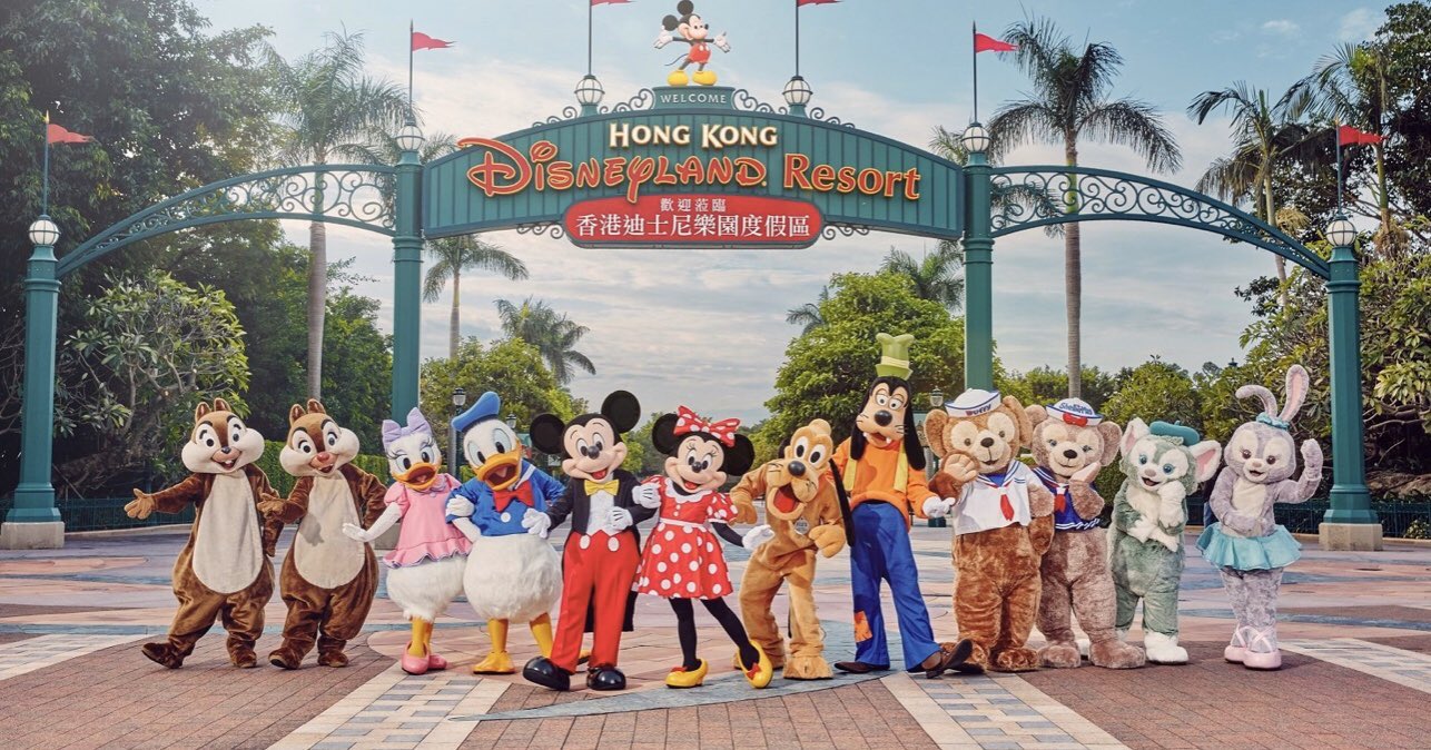 Characters pose at the entrance of Hong Kong Disneyland
