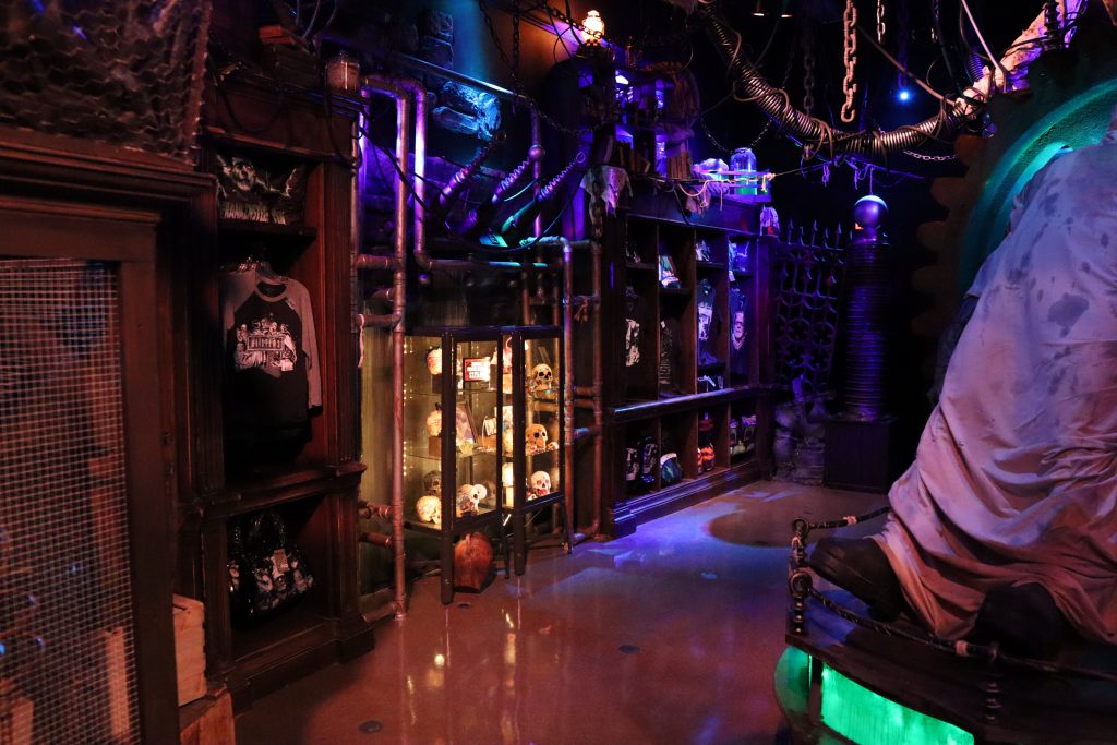 The area features Universal Classic Monsters merchandise, HHN skulls and an assortment of masks