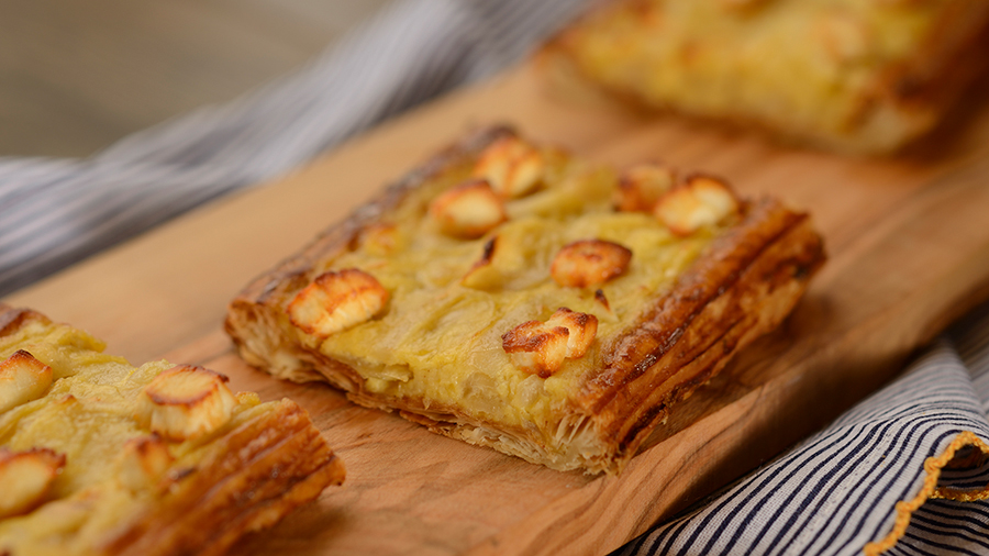 Tarte aux Oignons Caramelises Et Chévre: Goat Cheese Tart with Caramelized Onions on a Flaky Pastry Crust 