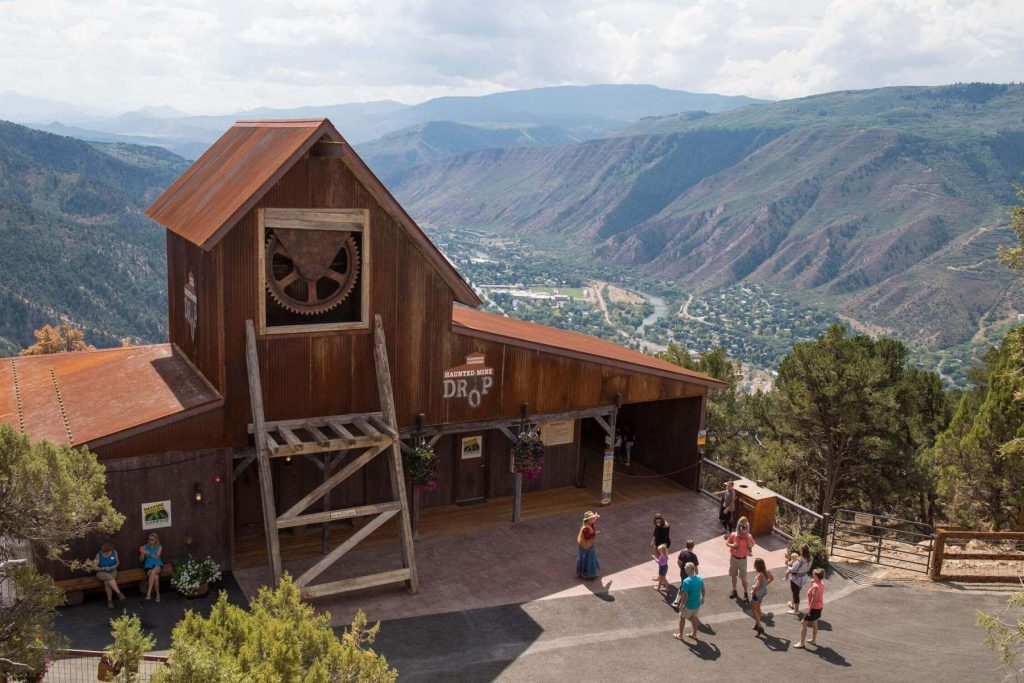 The Haunted Mine Drop, perched on top of Iron Mountain in Glenwood Springs, Colo., drops riders 110’ underground as they listen to ghostly mining tales from long ago.