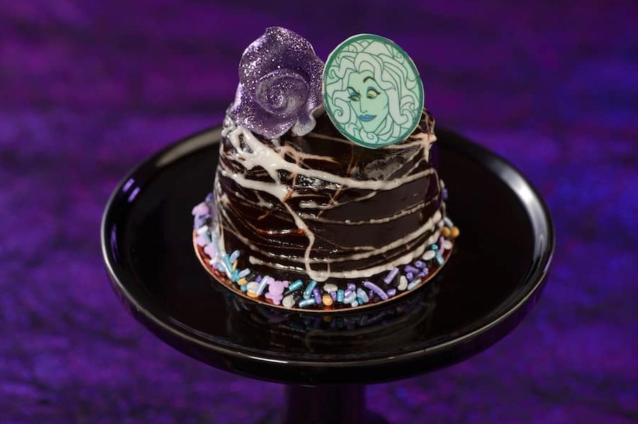 Madame Leota Dark Chocolate Cake: Devil’s Food mini cake filled with dark chocolate ganache topped with chocolate glaze and marshmallow webs