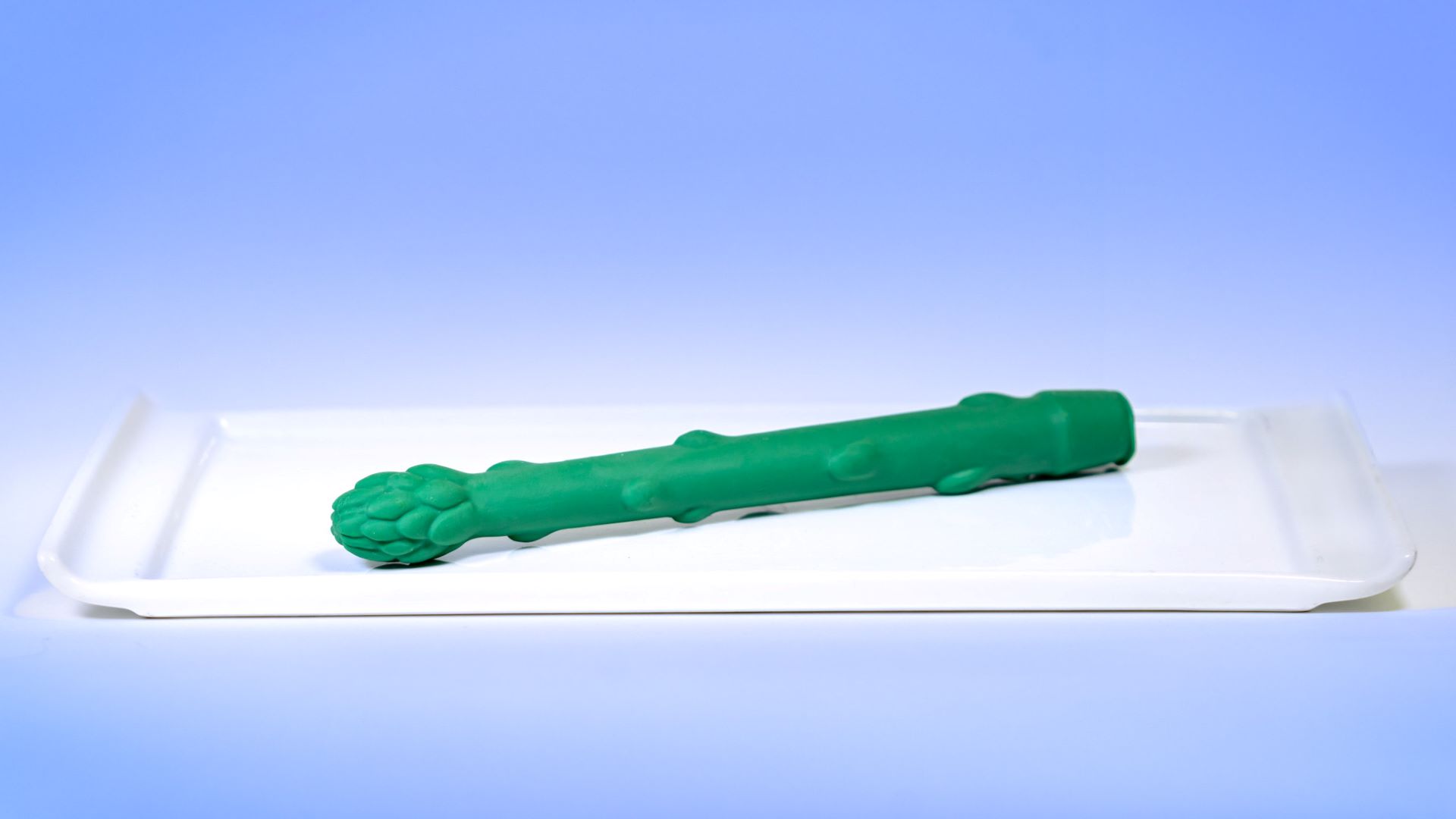 Magic “Asparagus” Pretzel: Pretzel rod coated in white chocolate